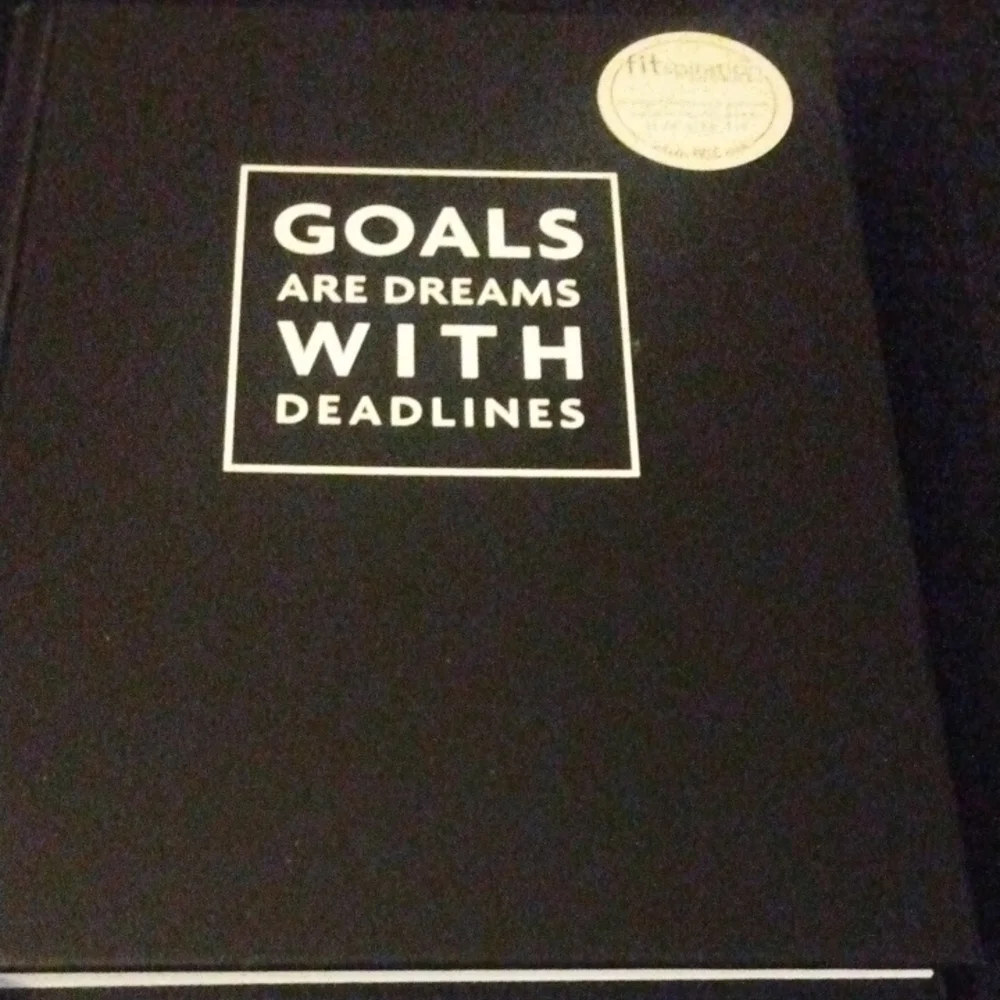 Source Unknown Black Planner with Motivational Quote